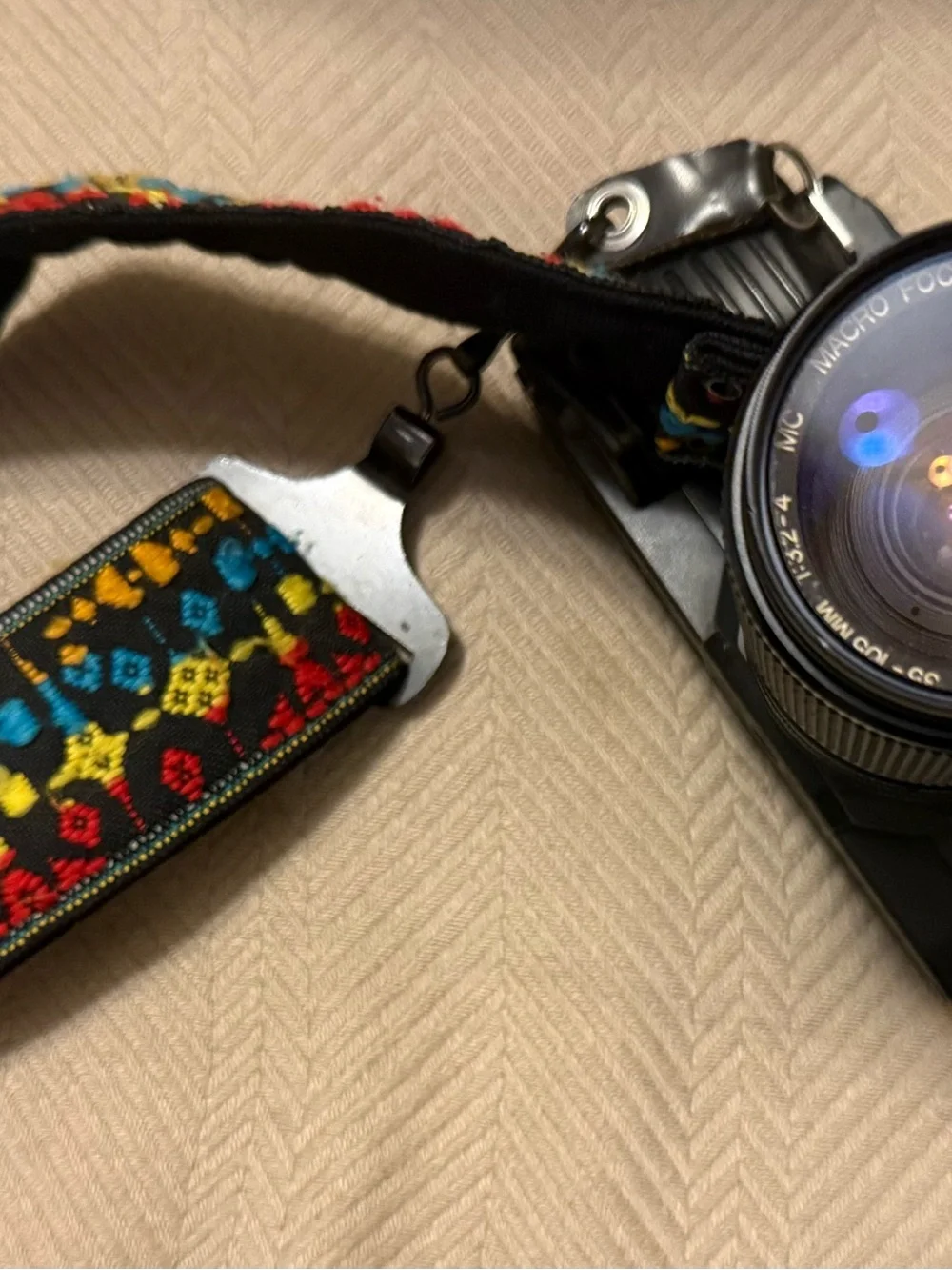 Canon T-70 35mm film camera with 35mm-105mm Zoom Lens with Multicolor Strap